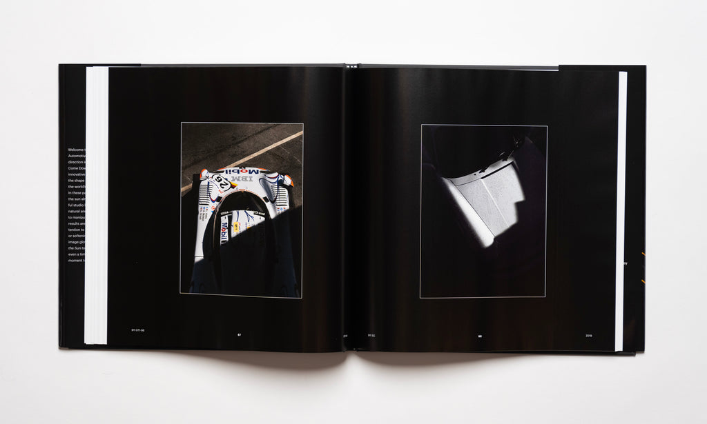 Inside spread of the automotive photography book Waiting For The Sun To Come Down by Kevin McCauley, open to images of a Porsche 911 GT1 and a Porsche 911 SC with stunning shadows. Published by Carrara Media.