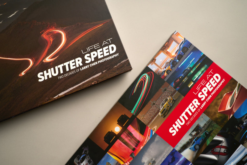 Studio photo of the Larry Chen book Life At Shutter Speed, a 400-page collector's item in hardcover photobook 14x11 format. The perfect coffee table book for auto enthusiasts featuring JDM, drifting, motorsports and car culture. Published by Carrara Media. Available now.