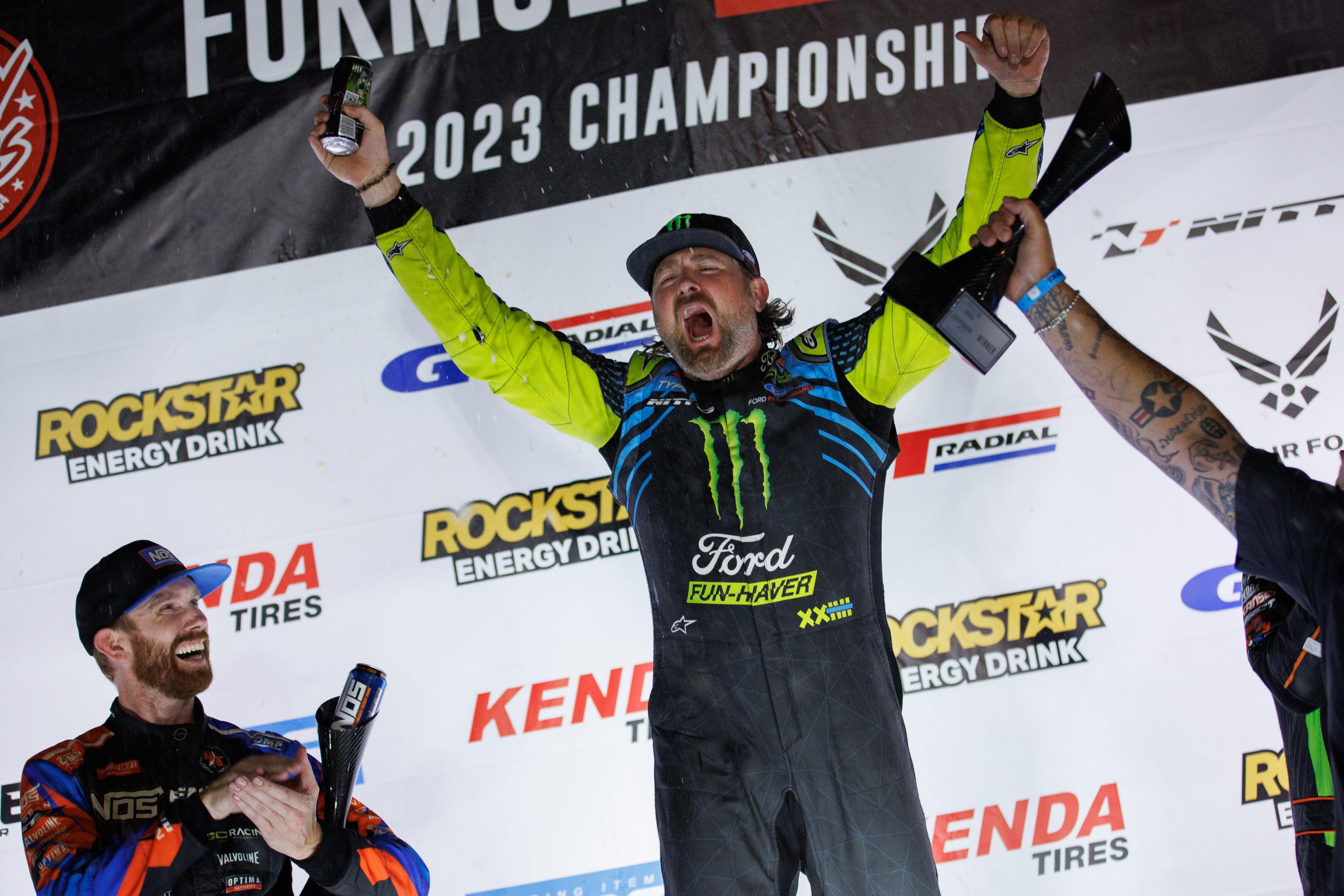 Image of Vaughn Gittin Jr. celebrating a Formula Drift victory, photo by Larry Chen. From the new book Ready To Rock by Vaughn Gittin Jr. with Mike Spinelli, foreword by T-Pain, published by Carrara Media. The story of RTR Vehicles and professional drifting, off-road racing and the Ford RTR Mustang and RTR Bronco.
